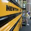 Students get off the school bus for their first day of school at Reed Intermediate School. Monday, August 26, 2019, Newtown, Conn. Three Republicans have dropped out of a forum for school board candidates.