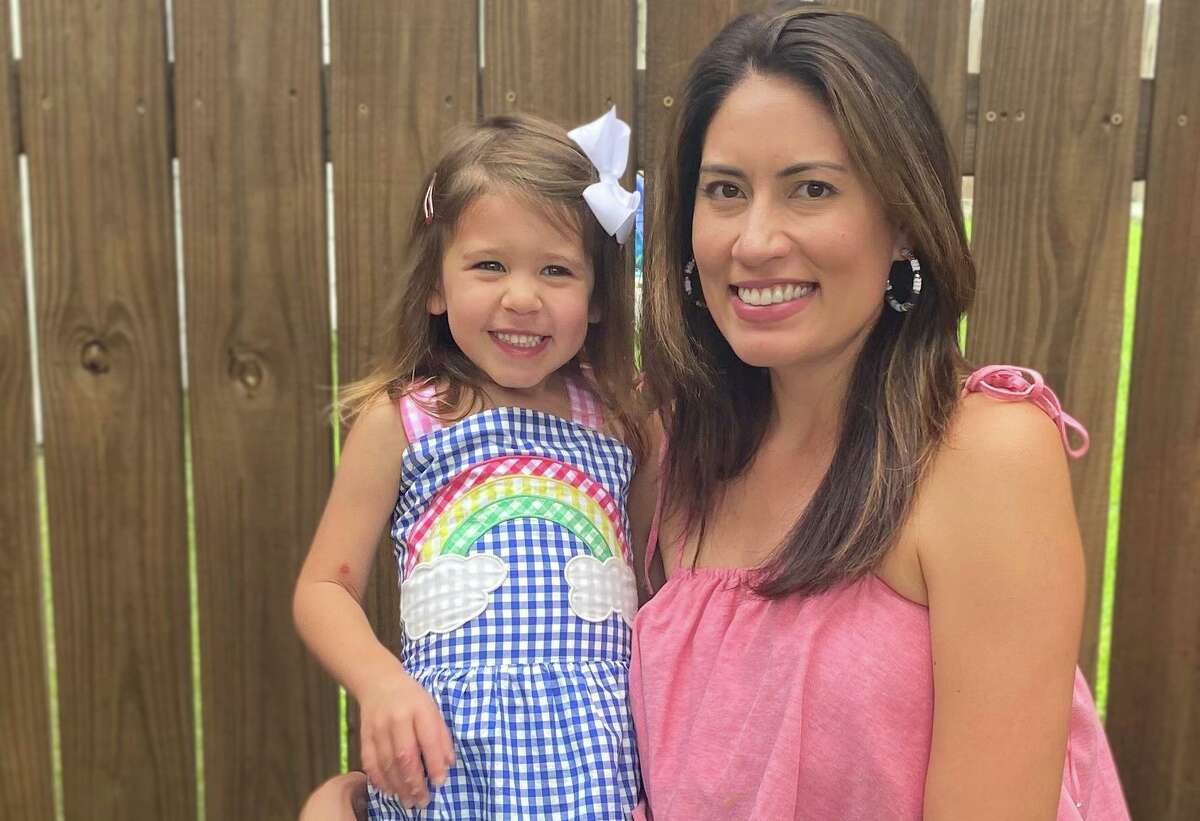 Growing up in Port Lavaca, Laureen Lucas, who is white and Filipino, was often assumed to be Latina and had to prove her Asian heritage in grade school. She is pictured with daughter Emmaline.