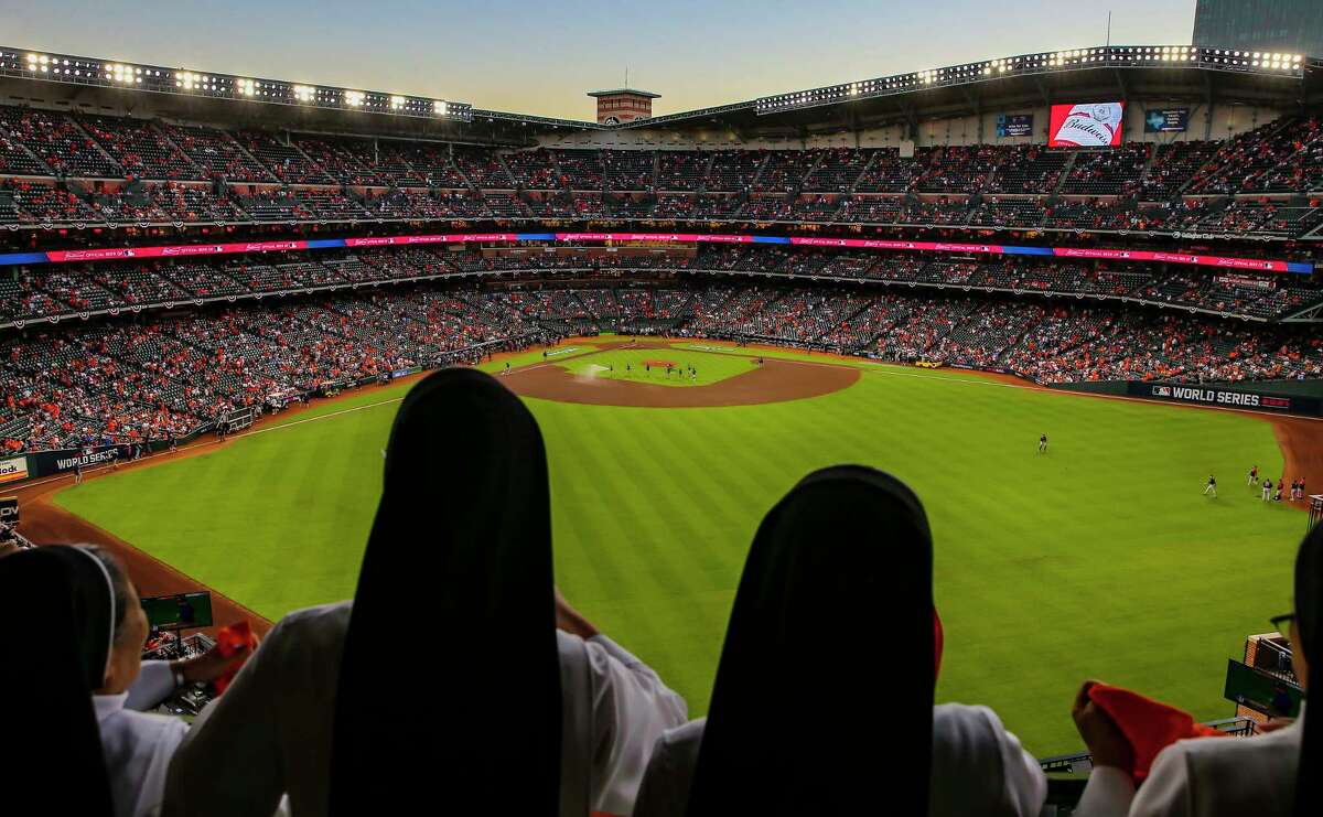 The "Rally Nuns" watch as the roof is opened before Game 2 of the World Series on Wednesday, Oct. 27, 2021 at Minute Maid Park in Houston.