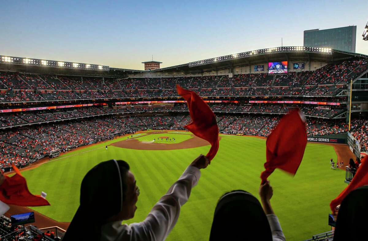 The "Rally Nuns" cheer as the roof is opened before Game 2 of the World Series on Wednesday, Oct. 27, 2021 at Minute Maid Park in Houston.