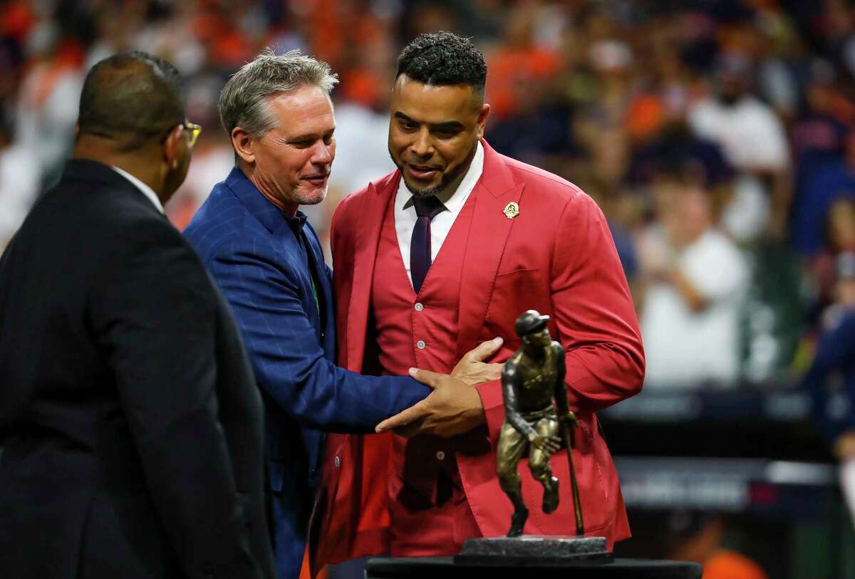 Craig Biggio with Nelson Cruz as Cruz is awarded the Roberto Clemente award before Game 2 of the World Series on Wednesday, Oct. 27, 2021 at Minute Maid Park in Houston.
