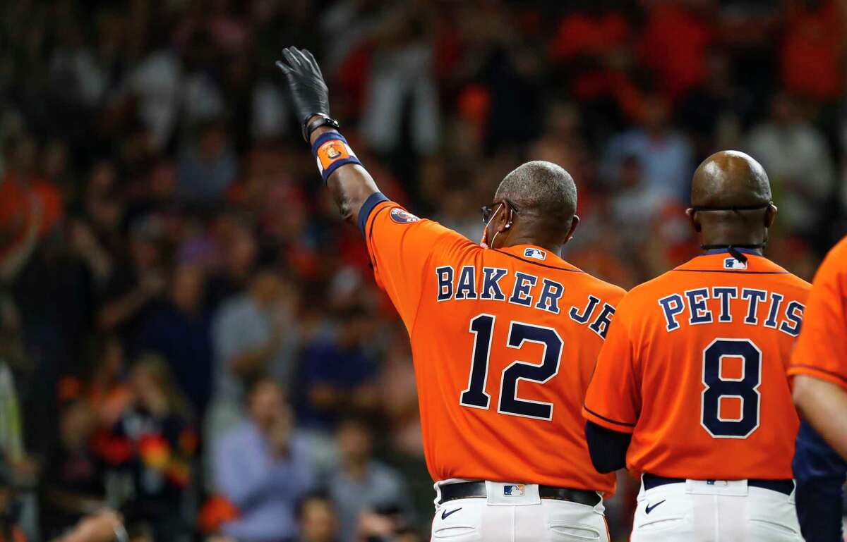Houston Astros manager Dusty Baker Jr. (12) waves to the crowd before Game 2 of the World Series on Wednesday, Oct. 27, 2021 at Minute Maid Park in Houston.