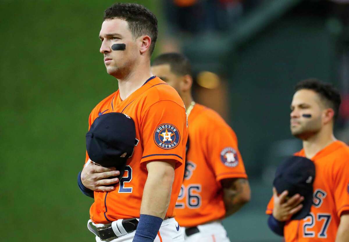 Houston Astros third baseman Alex Bregman (2) listens to the National Anthem before Game 2 of the World Series on Wednesday, Oct. 27, 2021 at Minute Maid Park in Houston.