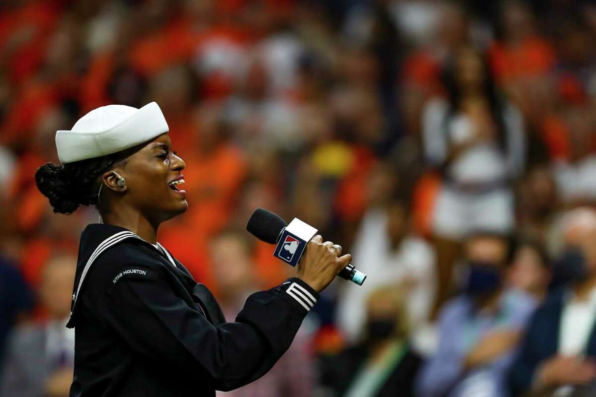 U.S. Navy Operations specialists Giavanni Walker sings the National Anthem before Game 2 of the World Series on Wednesday, Oct. 27, 2021 at Minute Maid Park in Houston.