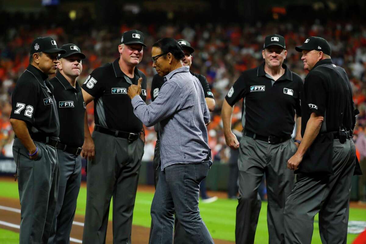 Jose Cruz talks to the officiating crew before Game 2 of the World Series on Wednesday, Oct. 27, 2021 at Minute Maid Park in Houston.