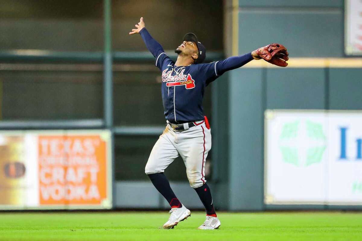 Atlanta Braves second baseman Ozzie Albies (1) waits for a pop out from Houston Astros right fielder Kyle Tucker (30) to end the third inning in Game 2 of the World Series on Wednesday, Oct. 27, 2021 at Minute Maid Park in Houston.