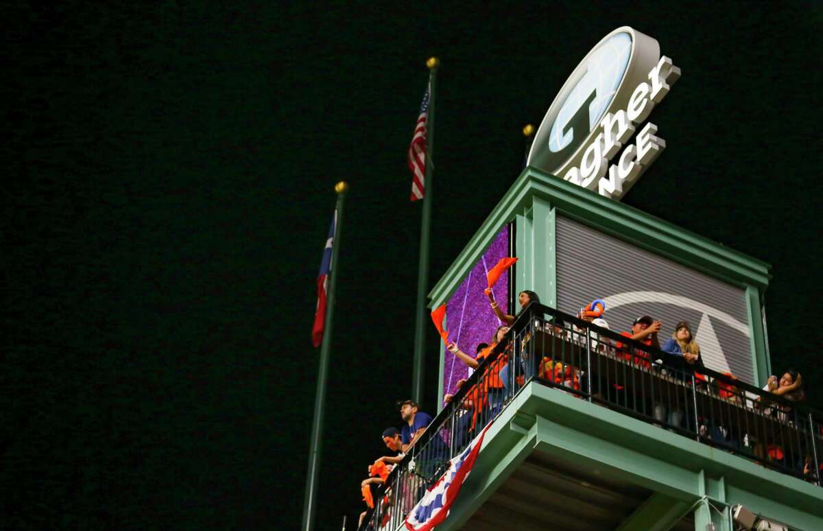 Fans watch Game 2 of the World Series on Wednesday, Oct. 27, 2021 at Minute Maid Park in Houston.