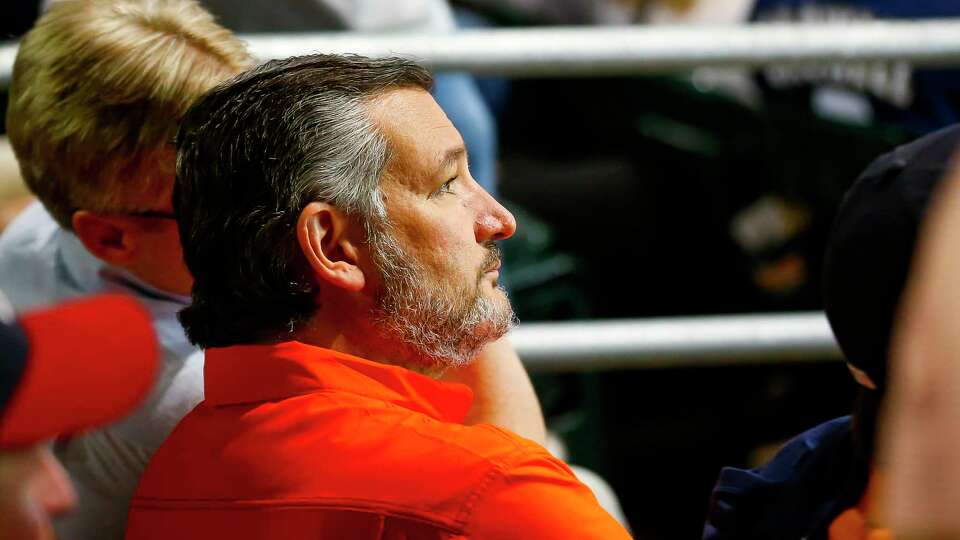 Texas Senator Ted Cruz watches Game 2 of the World Series on Wednesday, Oct. 27, 2021 at Minute Maid Park in Houston.