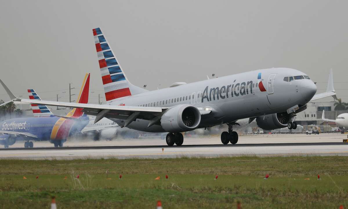 MIAMI, FLORIDA - JUNE 16: An American Airlines plane lands at the Miami International Airport on June 16, 2021 in Miami, Florida. Miami International Airport, founded in 1928, offers more flights to Latin America and the Caribbean than any other U.S. airport, is Americaâs third-busiest airport for international passengers, and is the top U.S. airport for international freight. (Photo by Joe Raedle/Getty Images)