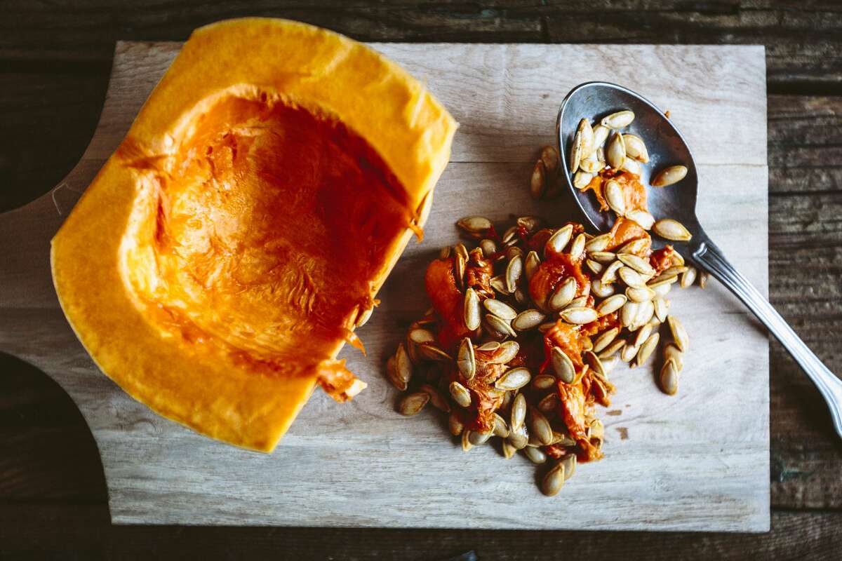 Seeds spooned from a pumpkin.