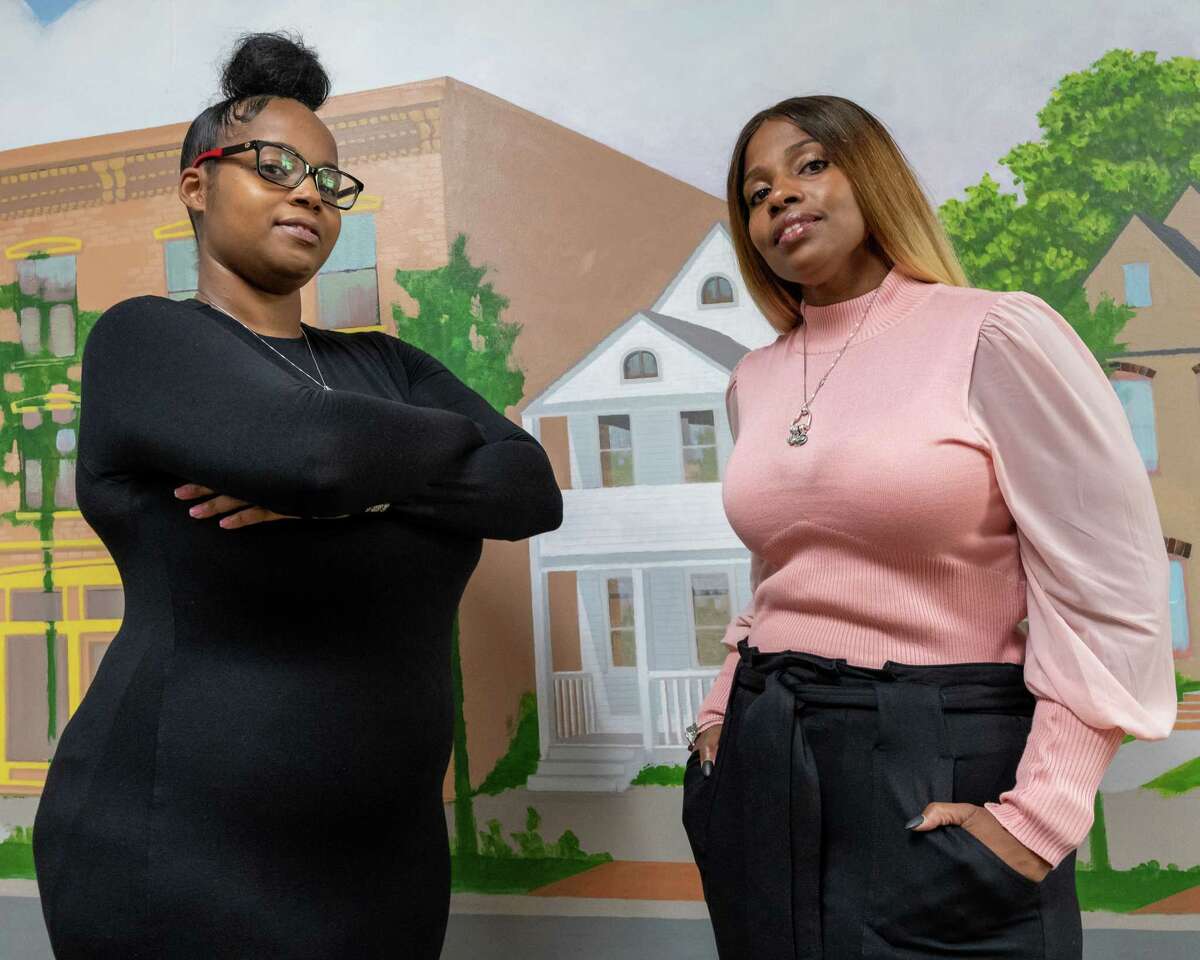 LaQuetta Alexander (left) and Odaysia Burton-Garland, founders and owners of the Hearts and Minds Training Center, a medical training center specializing in training phlebotomists and EKG technicians at the Community Loan Fund of the Capital Region small business incubator building on Orange Street in Albany, NY. (Jim Franco/Special to the Times Union)