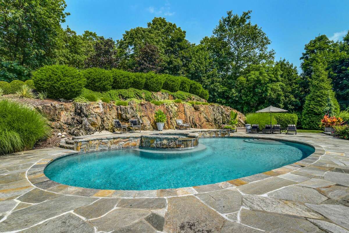 The home on 101 Cross Highway in Westport, Conn. has a heated pool and spa.
