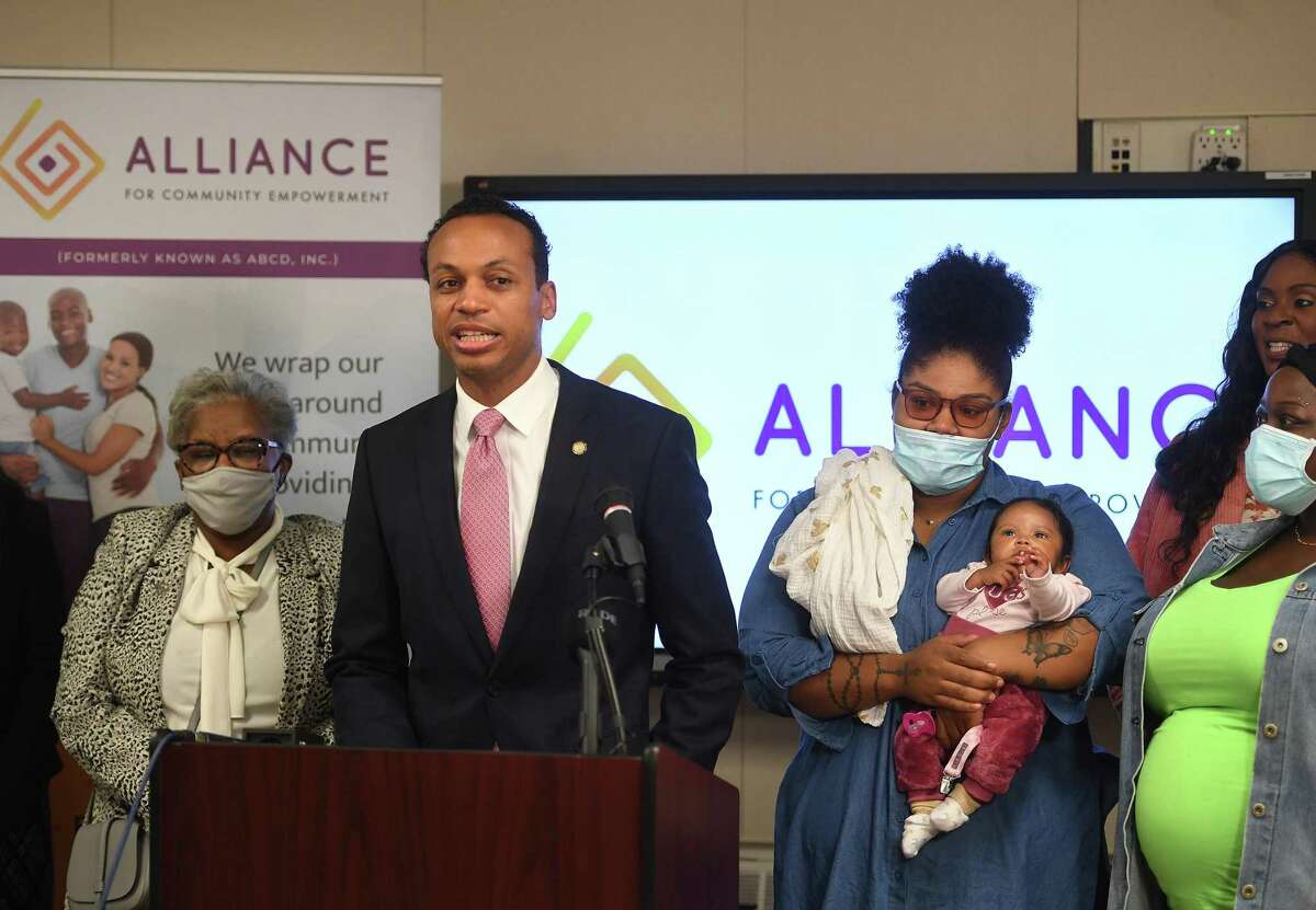 Connecticut Treasurer Shawn T. Wooden announces the new state Baby Bonds program at Alliance for Community Empowerment in Bridgeport, Conn. on Thursday, October 28, 2021. The program puts aside money for babies born into poverty for use later in life for higher education, home purchase, or business start up.