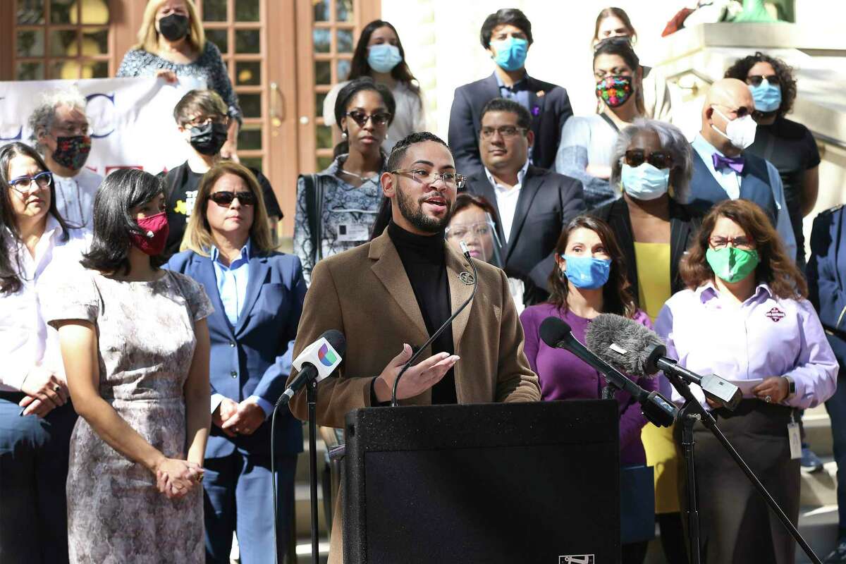 District 2 Councilman Jalen McKee-Rodriguez (center) leads a press conference on the steps of City Hall calling for the council to consider an expansion of San Antonio's non-discrimination ordinance.
