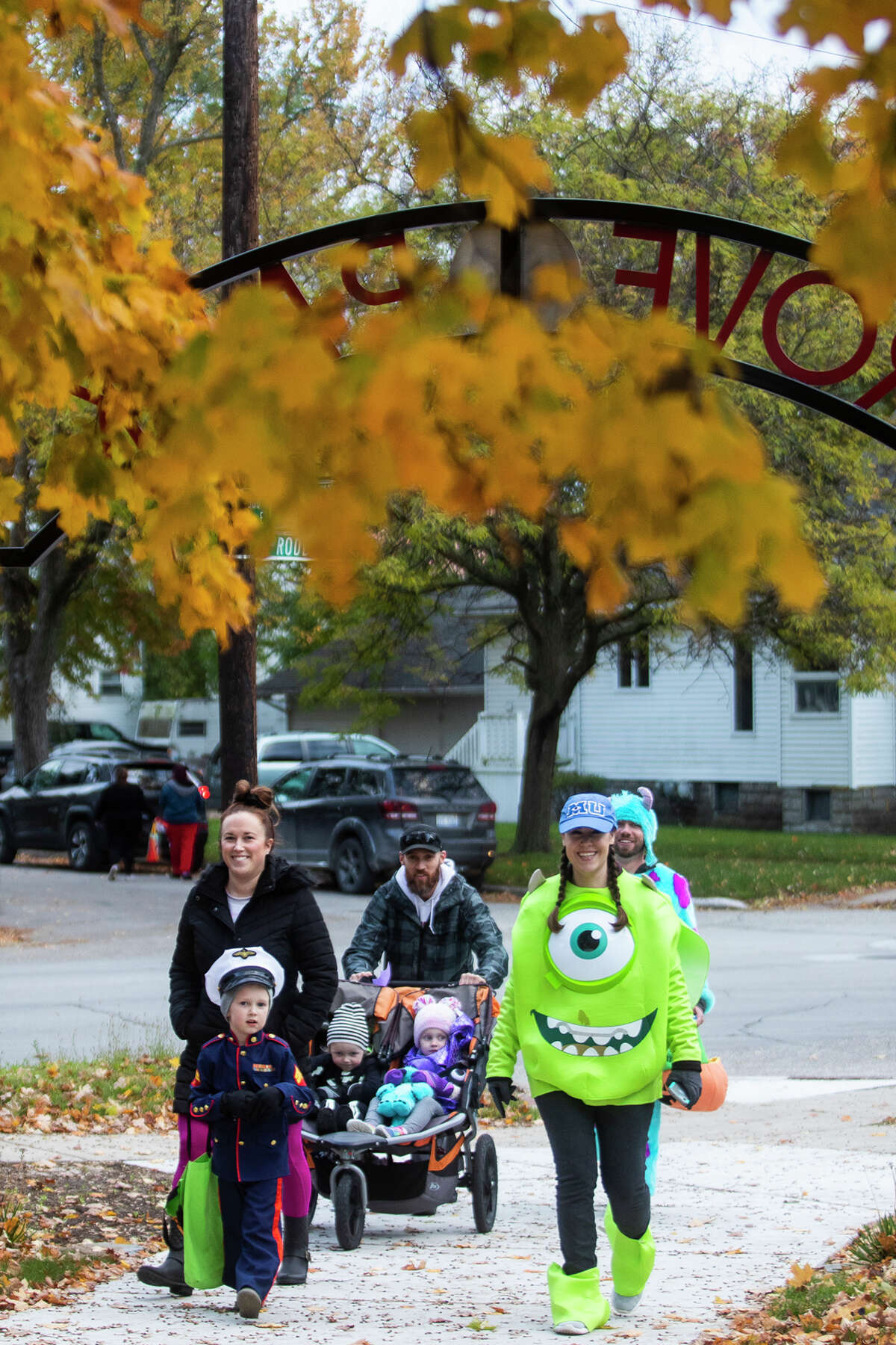 Children collect candy during a trunk-or-treat event Thursday, Oct. 28, 2021 at Grove Park in Midland. (Katy Kildee/kkildee@mdn.net)