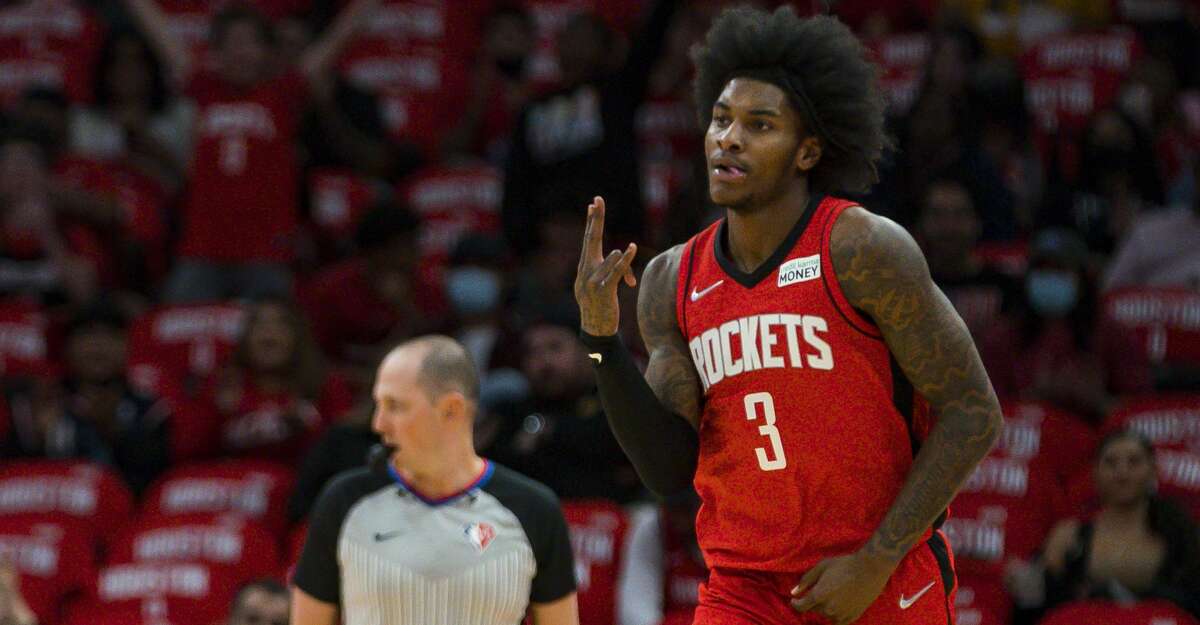 Houston Rockets guard Kevin Porter Jr. (3) celebrates a made three point shot during the first half of an NBA game between the Houston Rockets and Utah Jazz on Thursday, Oct. 28, 2021, at Toyota Center in Houston.
