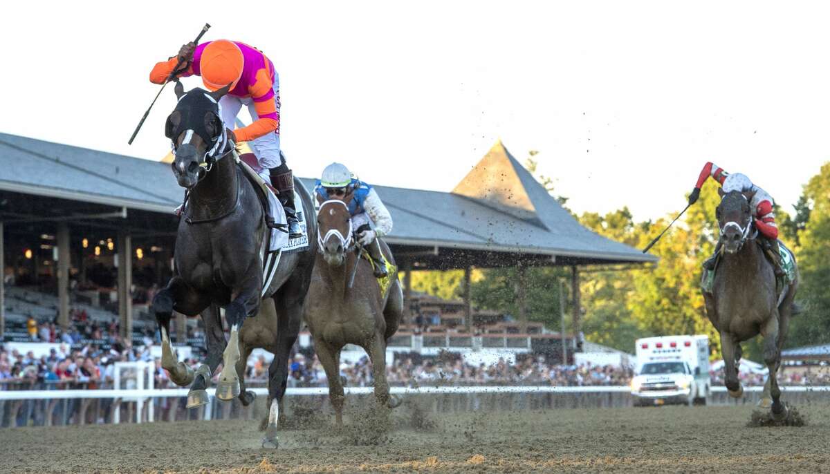 Jockey Ricardo Santana Jr. moves passed Forza Di Oro with Junior Alvarado to win the 123rd running of the Jockey Club Gold Cup at the Saratoga Race Course Saturday Sep, 4, 2021 in Saratoga Springs, N.Y. Special to the Times Union Photo by Skip Dickstein/Tim Lanahan