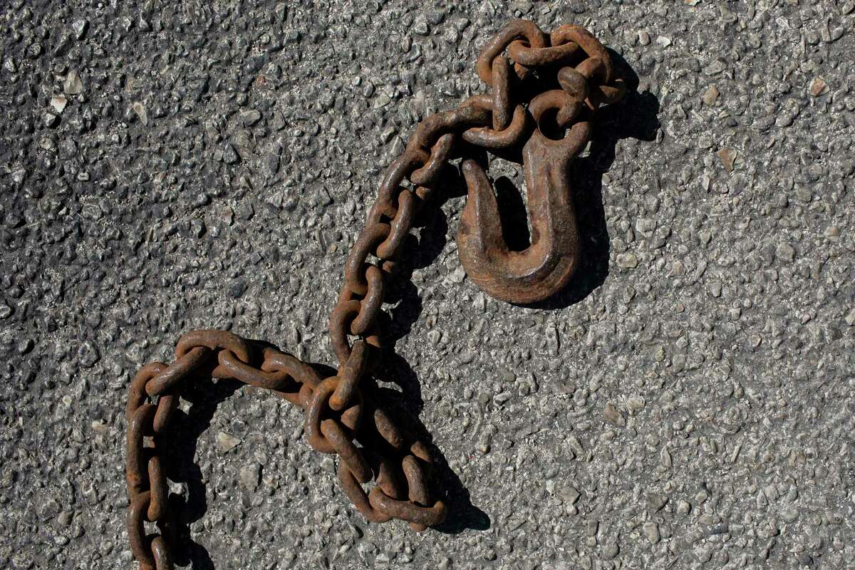 A towing chain was used to restrain a dog illegally is seen outside the Animal Care Services campus San Antonio, Texas, on Oct. 28, 2021.