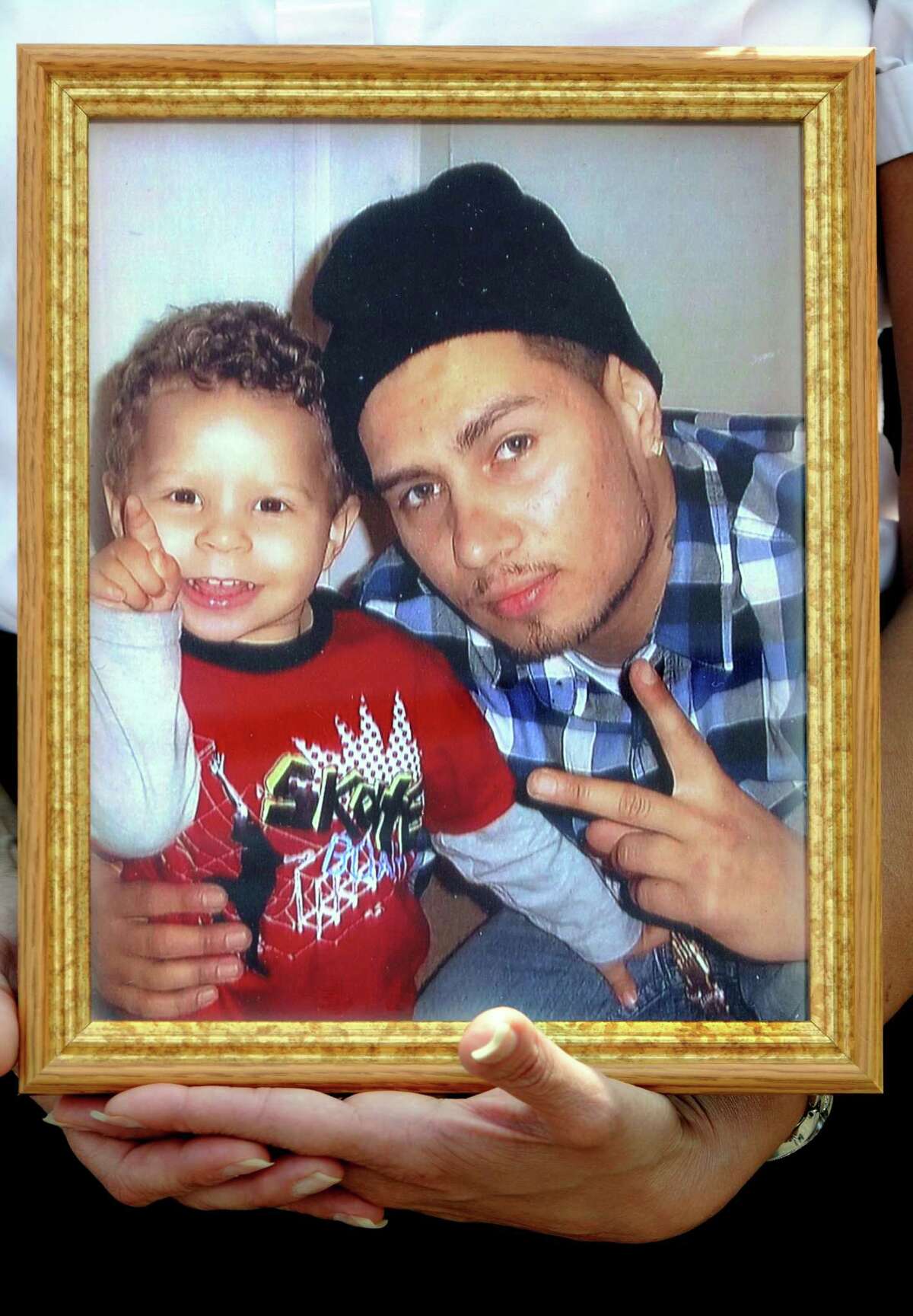 Isaia Hernandez pictured with son Jisaiah age 2.