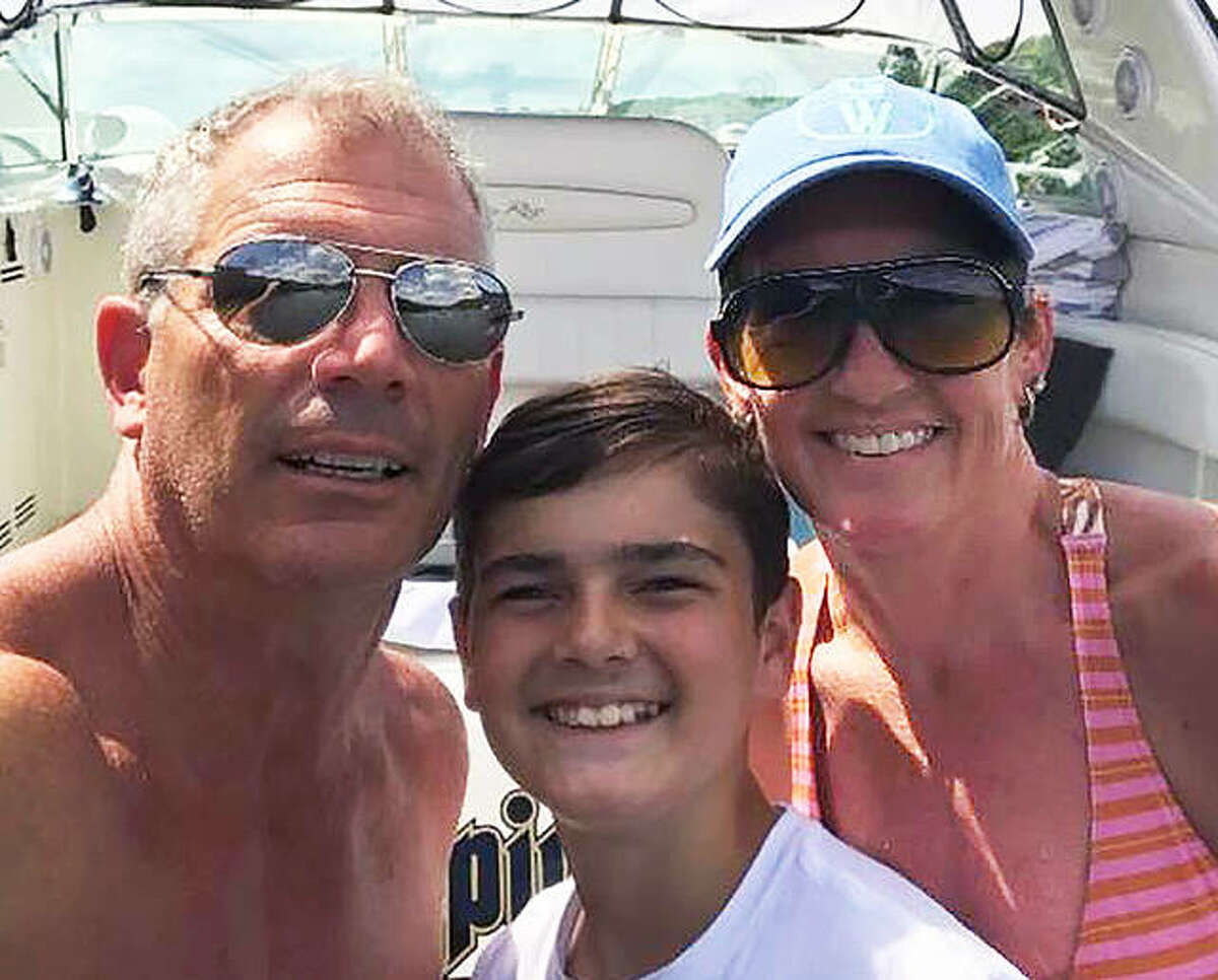 John Cafazza, left, his wife Missy and their 12-year-old son Dominic were killed in an Aug. 13, 2021 crash involving Blake A. Jones of Worden. The family's estate has filed a dram shop suit against Stutz Excavating. 