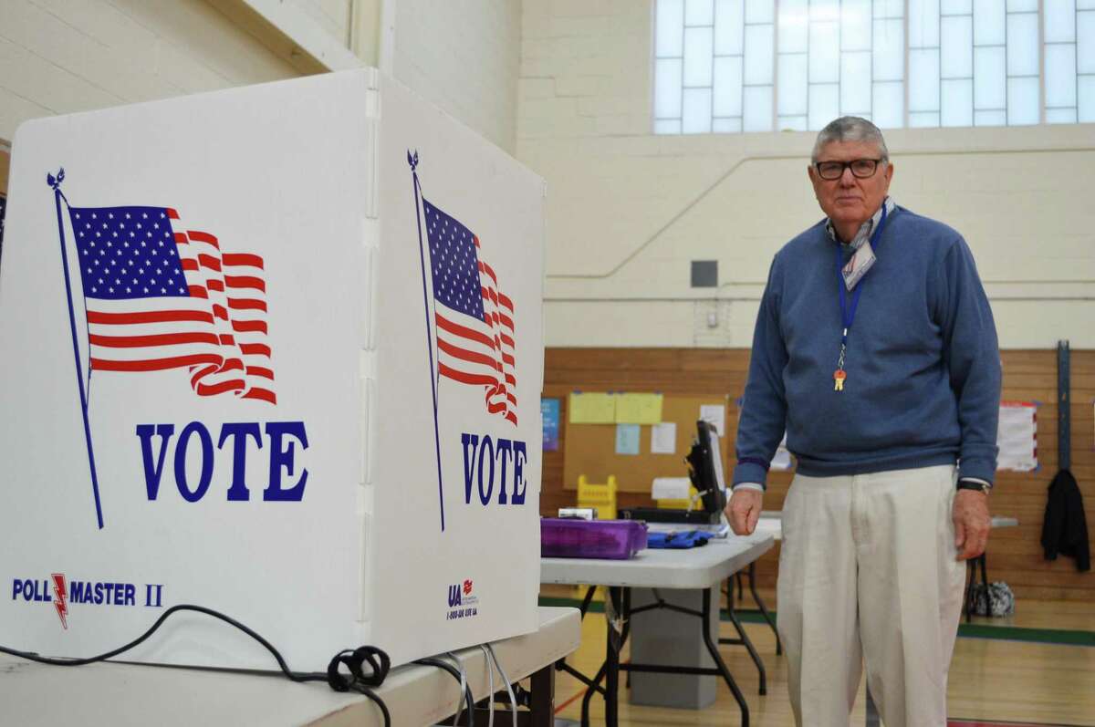 File photo of an earlier election at the District 6 polling place in Long Lots Elementary School.