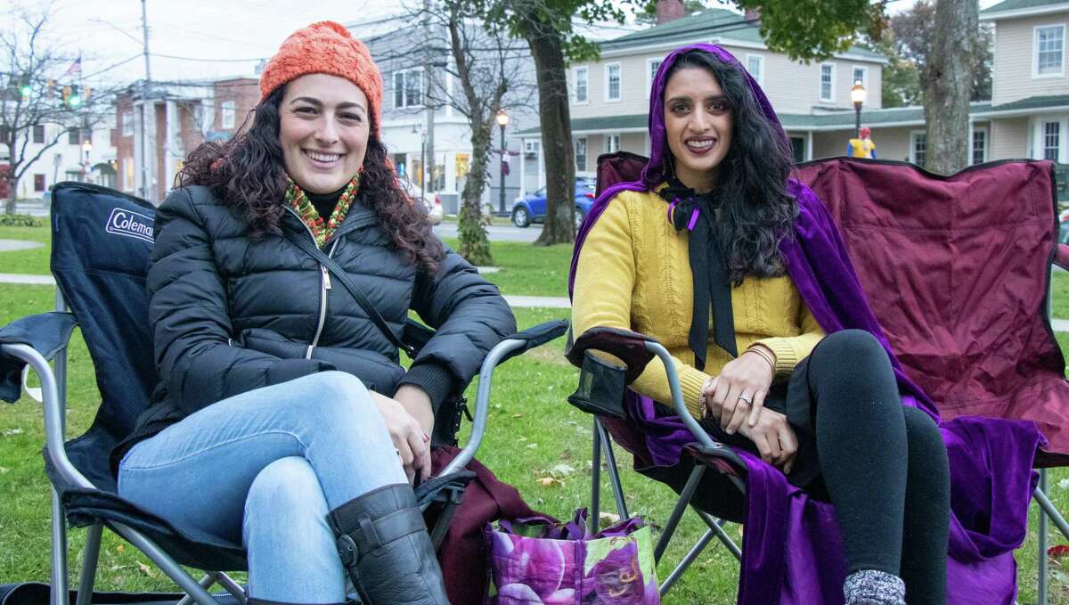 Nicole Grosso (left) and Meghana Parikh get ready to enjoy the movie Hocus Pocus on the Milford Green. The DMBA started off their Hall-O-Weekend with a free screening of Hocus Pocus on the Milford Green.
