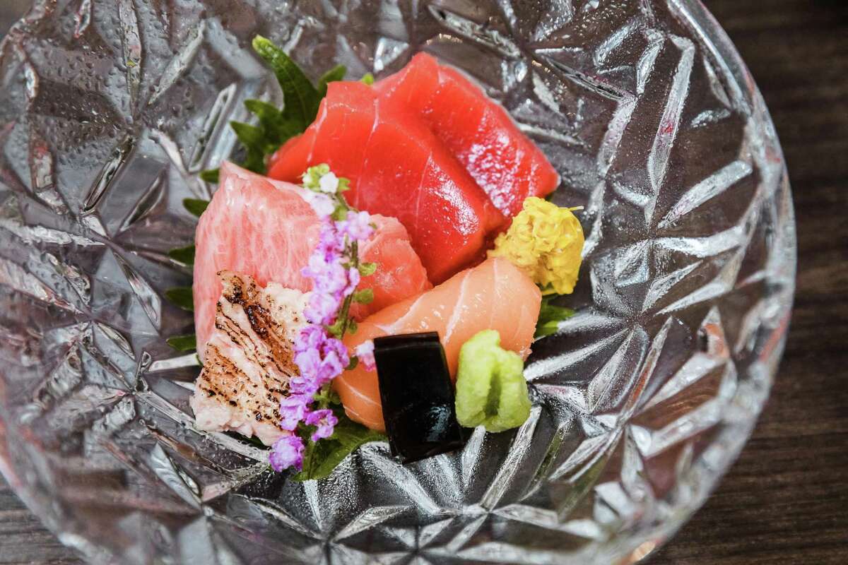 Boston Bluefin Tuna and Half Moon Bay King Salmon Sashimi served with Chrysanthemum at Kaiseki Saryo Hachi in Burlingame, California.