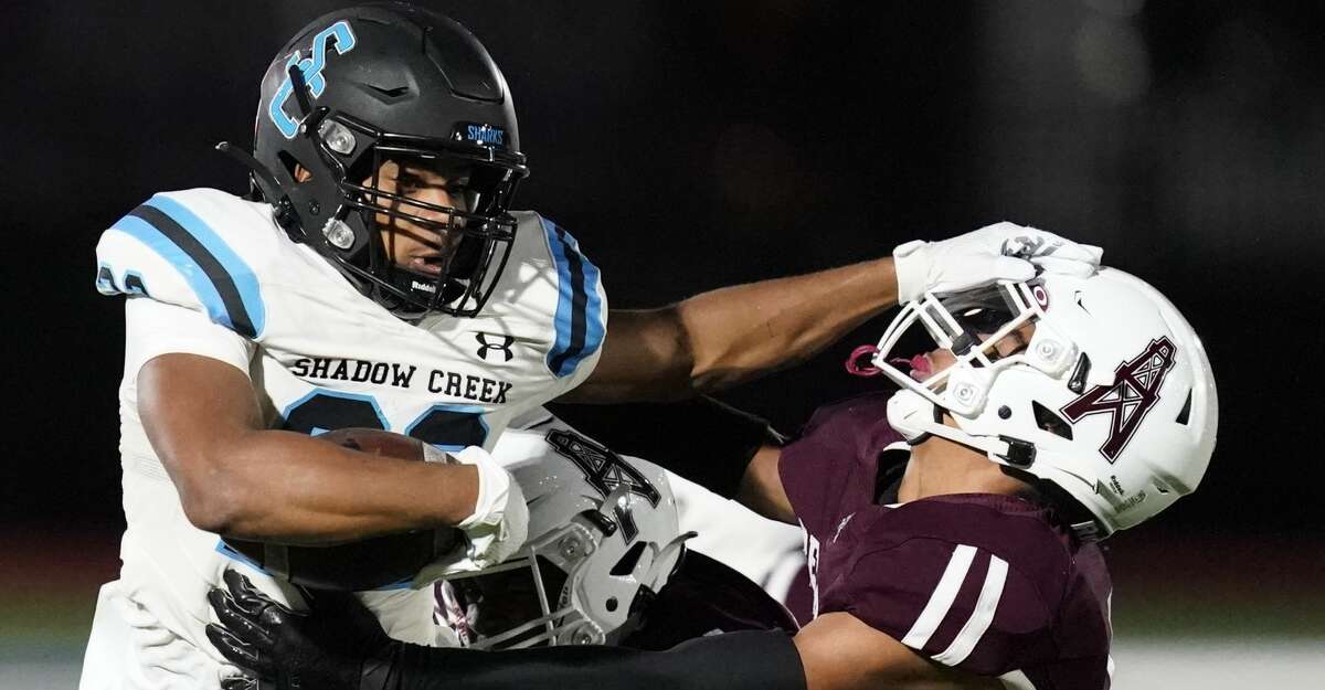 Shadow Creek Sharks running back Jacob Washington #22 rushes against the Pearland Oilers in the first half of a District 23-6A high school football game on October 29, 2021 at The Rig in Pearland , TX.