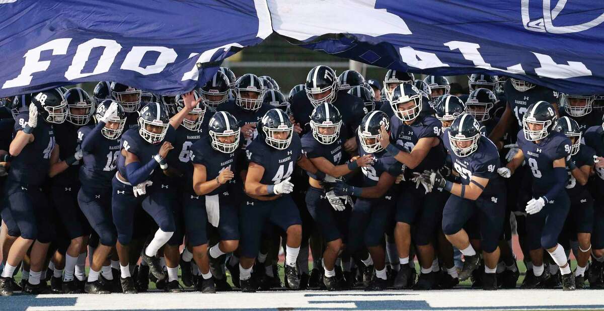 The Smithson Valley Rangers take the field against East Central on Friday, Oct. 29, 2021.