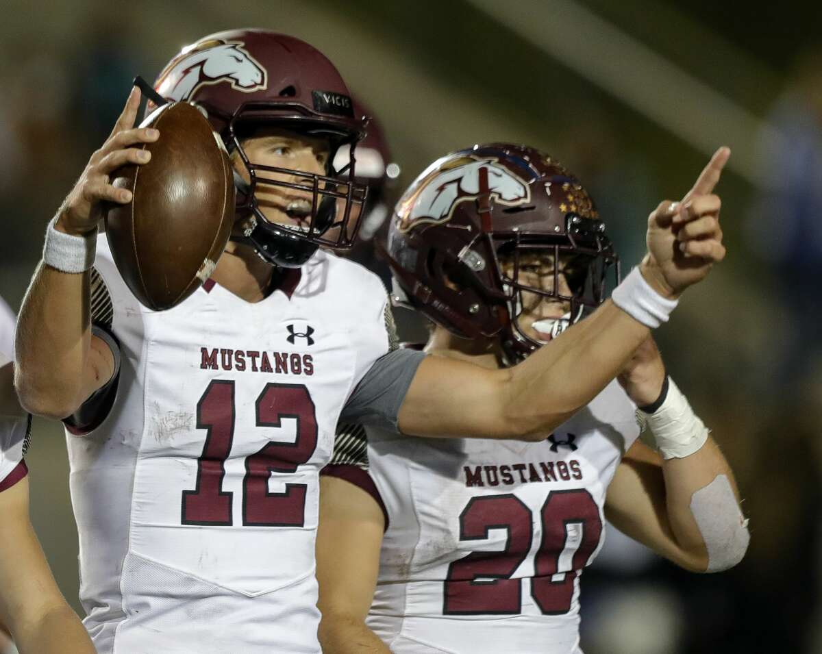 Magnolia West quarterback Brock Dalton (12) celebrates after defeating New Caney 31-24 during a high school football game at Randall Reed Stadium, Friday, Oct. 29, 2021, in New Caney. Magnolia West defeated