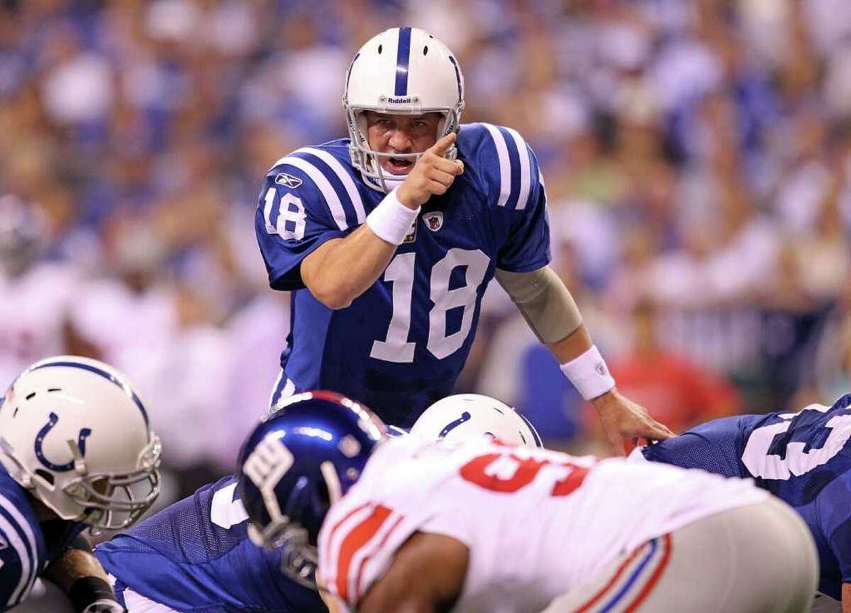INDIANAPOLIS - SEPTEMBER 19: Peyton Manning #18 of the Indianapolis Colts gives instructions to his team during the NFL game against the New York Giants at Lucas Oil Stadium on September 19, 2010 in Indianapolis, Indiana. (Photo by Andy Lyons/Getty Images) *** Local Caption *** Peyton Manning