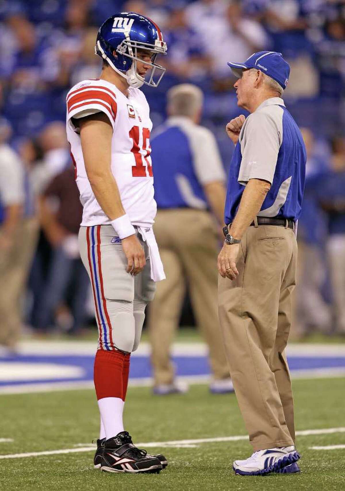 INDIANAPOLIS - SEPTEMBER 19: Eli Manning #10 of the New York Giants talks with Head Coach Tom Coughlin before the NFL game against the Indianapolis Colts at Lucas Oil Stadium on September 19, 2010 in Indianapolis, Indiana. (Photo by Andy Lyons/Getty Images) *** Local Caption *** Eli Manning;Tom Coughlin