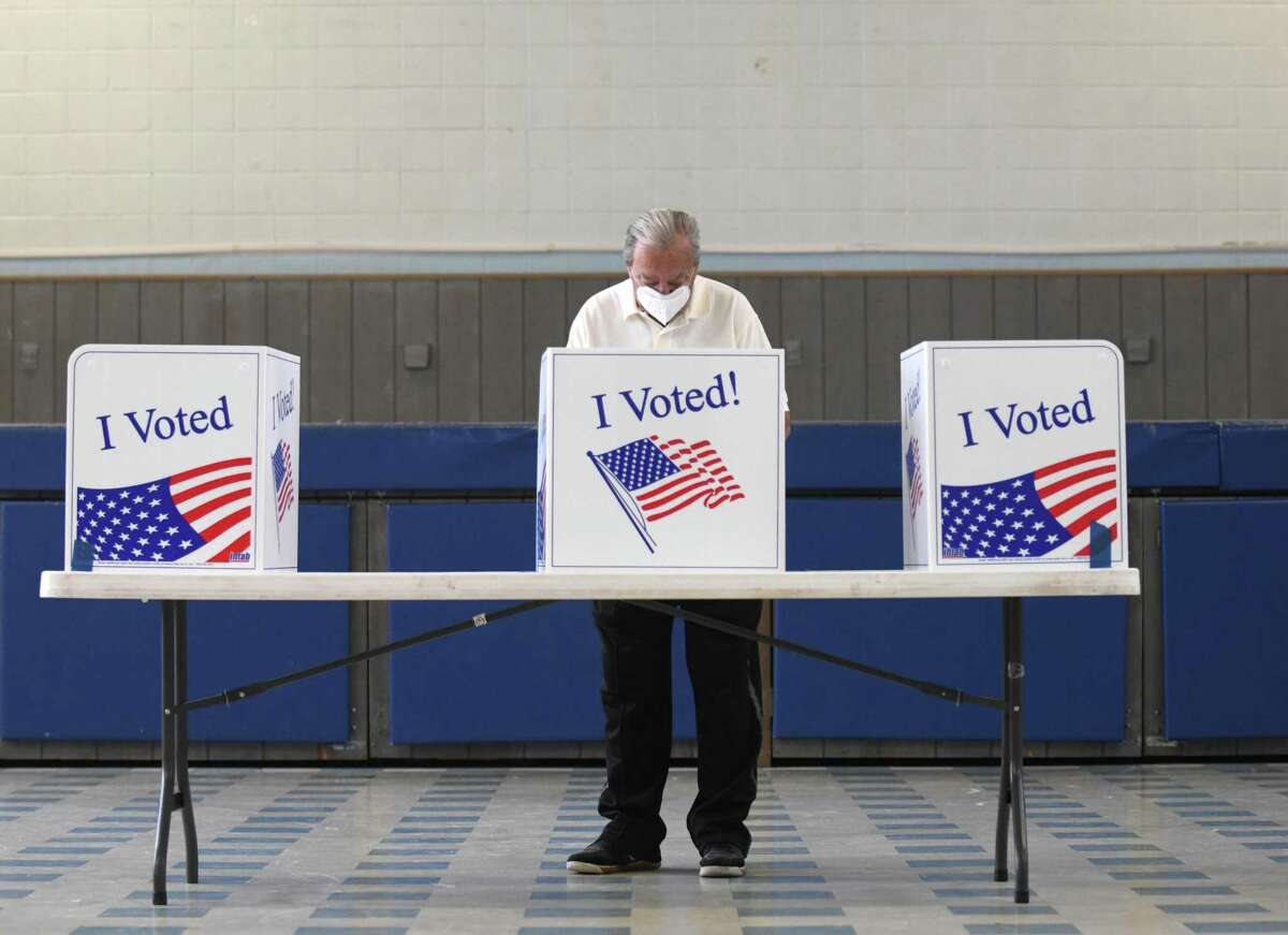 Stamford resident Robert Accurso gets ready to vote at the Recreation Star Center on Primary Election Day in Stamford, Conn. Tuesday, Sept. 14, 2021. Registered Democrats voted between incumbent Mayor David Martin and challenger State Rep. Caroline Simmons to choose who would face off against former Major League Baseball manager Bobby Valentine in the Stamford mayoral election in November.