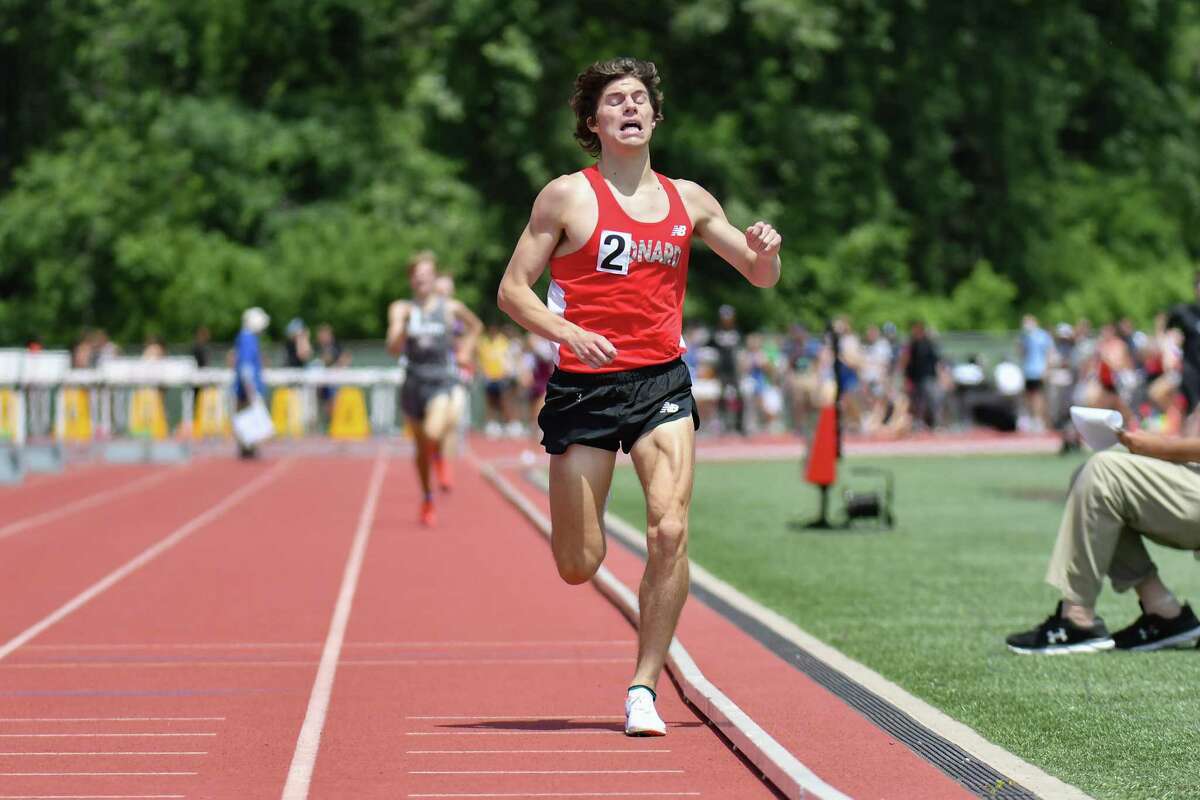 Gavin Sherry of Conard wins the 1600 meter run with a new record during the CT State Open Track and Field Championship on June 10, 2021 at Willow Brook Park in New Britain, CT.