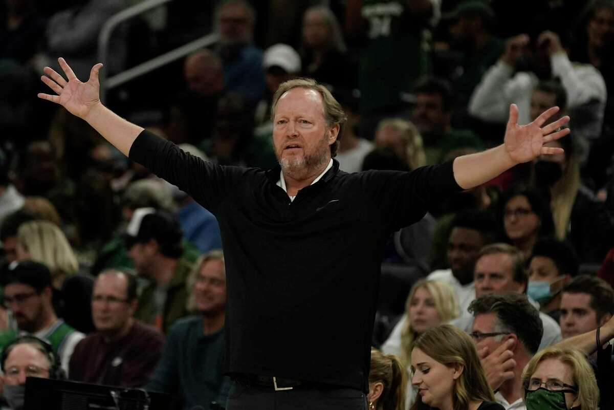 Milwaukee Bucks head coach Mike Budenholzer reacts during the second half of an NBA basketball game against the Brooklyn Nets Tuesday, Oct. 19, 2021, in Milwaukee. (AP Photo/Morry Gash)
