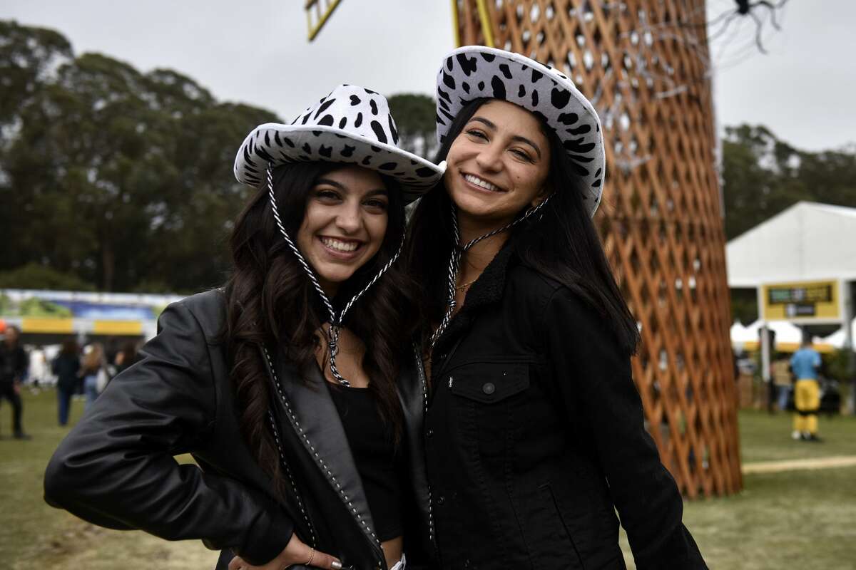 Miriam M. and Reem Y. of Orange County sport cow print hats at Outside Lands, on Saturday, Oct. 29, 2021.