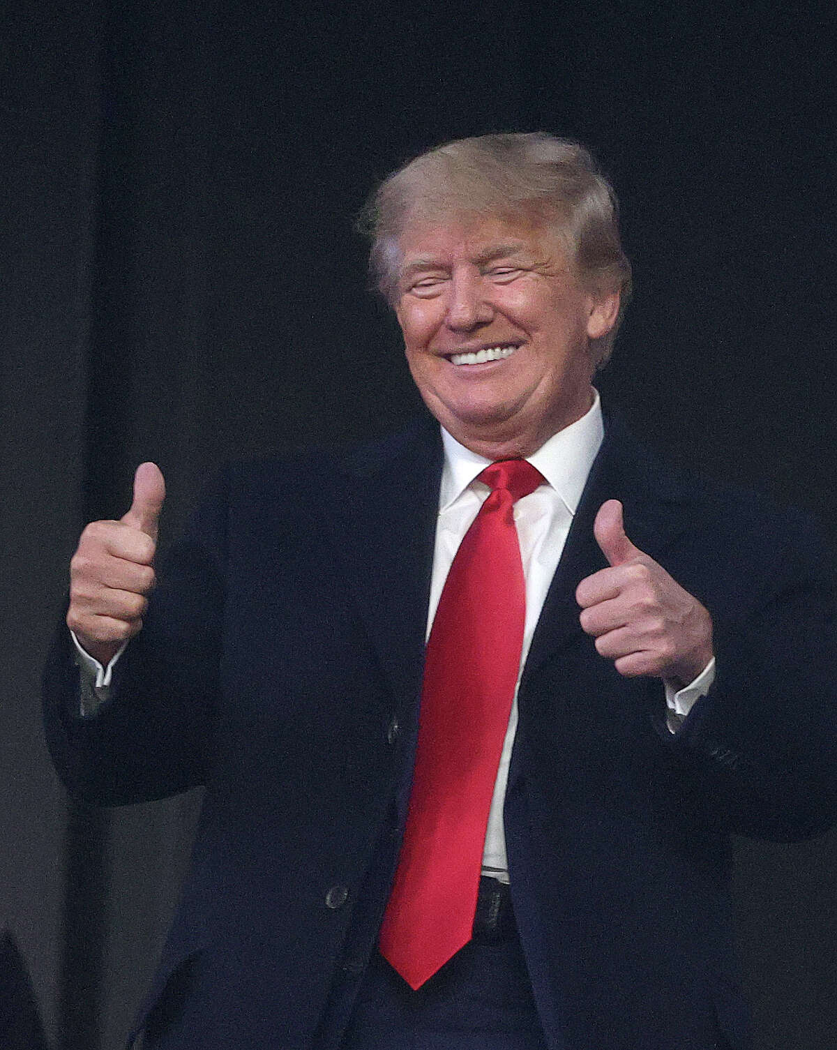 ATLANTA, GEORGIA - OCTOBER 30: Former president of the United States Donald Trump gives a thumbs up prior to Game Four of the World Series between the Houston Astros and the Atlanta Braves Truist Park on October 30, 2021 in Atlanta, Georgia.