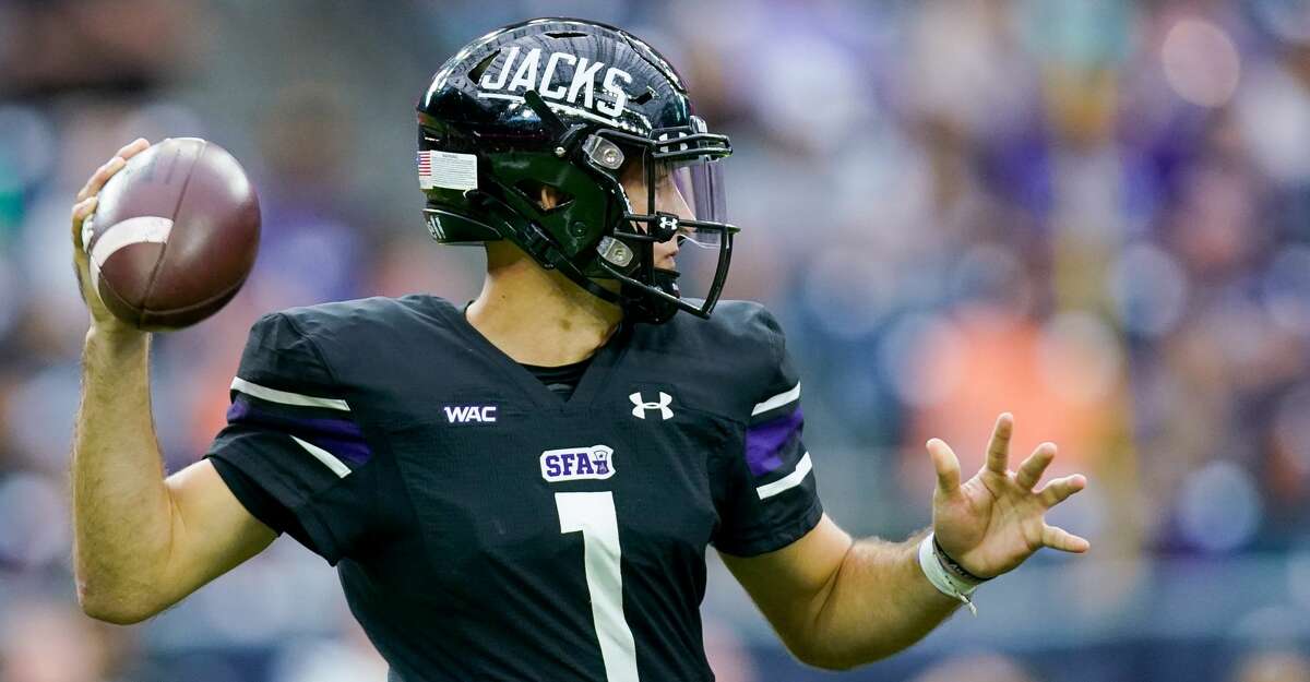 Stephen F. Austin Lumberjacks quarterback Trae Self (1) throws the ball against the Sam Houston State Bearkats during the second quarter of an NCAA game at NRG Stadium on Saturday, Oct. 2, 2021, in Houston.