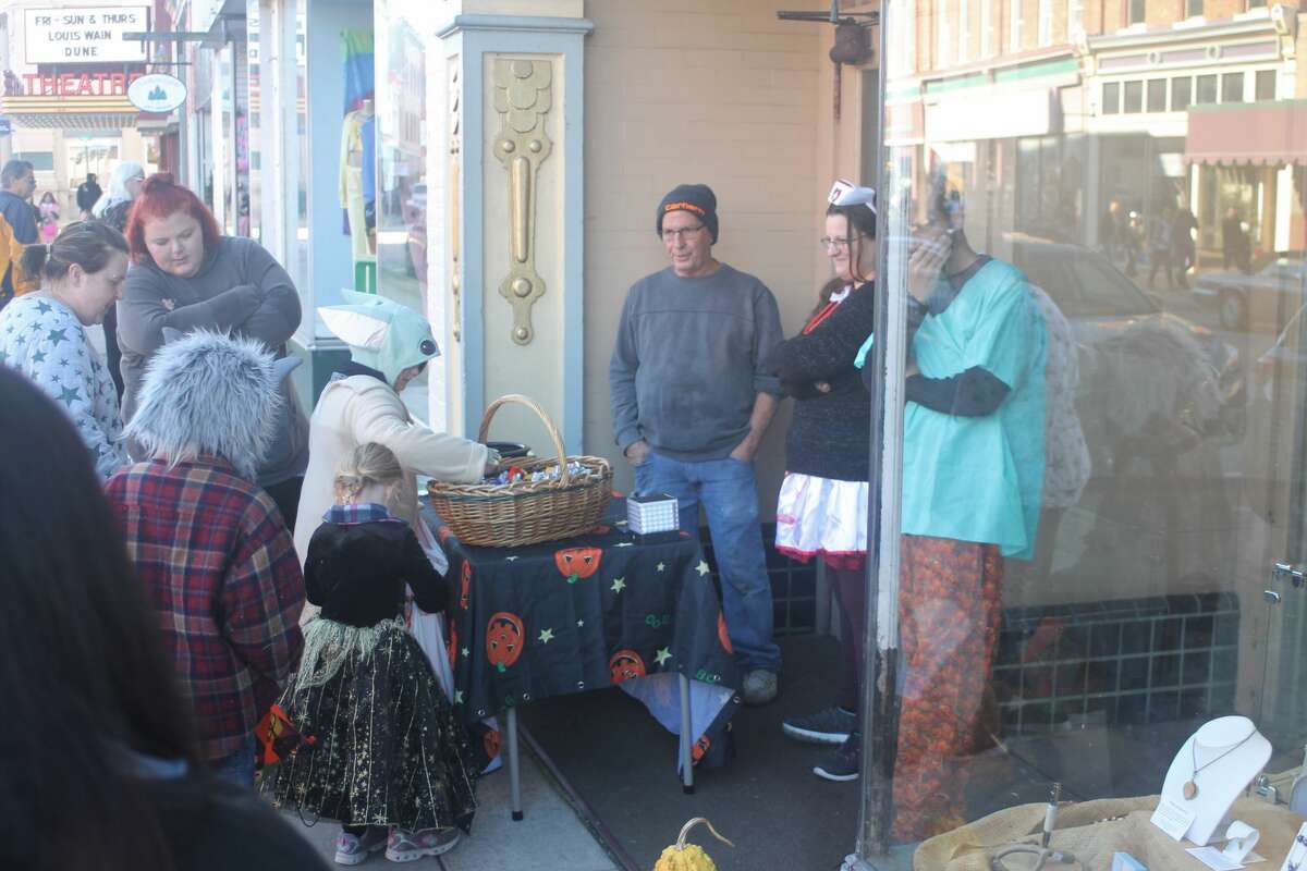 Downtown Manistee saw plenty of hustle and bustle Saturday as Boos, Brews and Brats brought trick-or-treating, costume contests, games, live music and more.