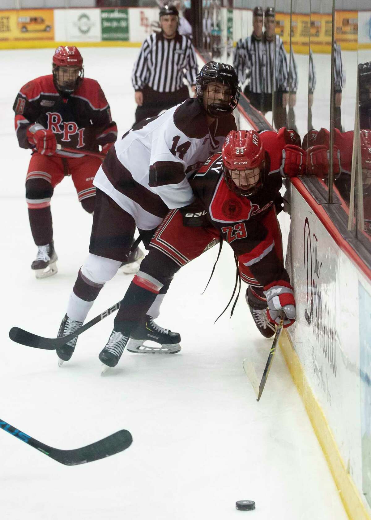 Union forward Andrew Seaman checks RPI defenseman Jake Johnson on Oct. 30. The first-year forward has four points in 12 games for the Dutchmen.