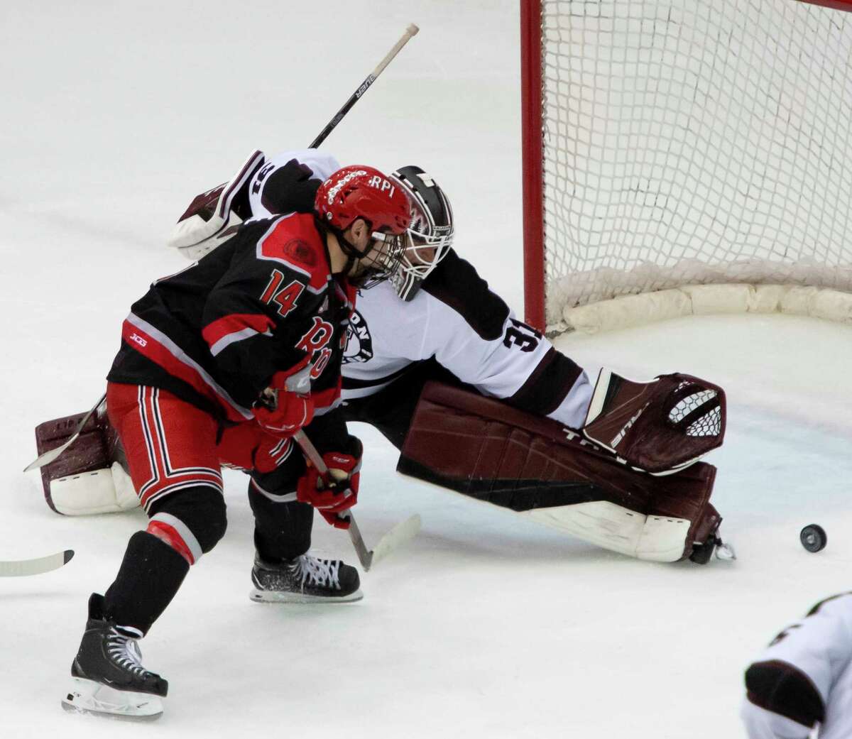 RPI forward Zach Dubinsky looks on as the puck slides into the goal past Union goaltender Connor Murphy RPI during a game Saturday night, Oct. 30, 2021, at Rensselaer Polytechnic Institute in Troy, N.Y. (Jenn March, Special to the Times Union)