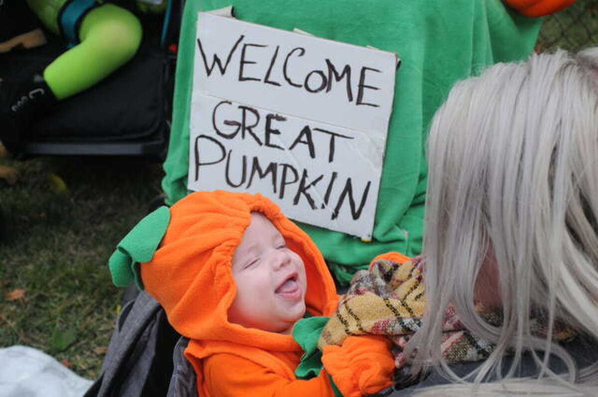 Three-month-old Tate Daniels of East Alton enjoys his first Wood River Halloween Parade on Saturday. Additional photos are online at thetelegraph.com.