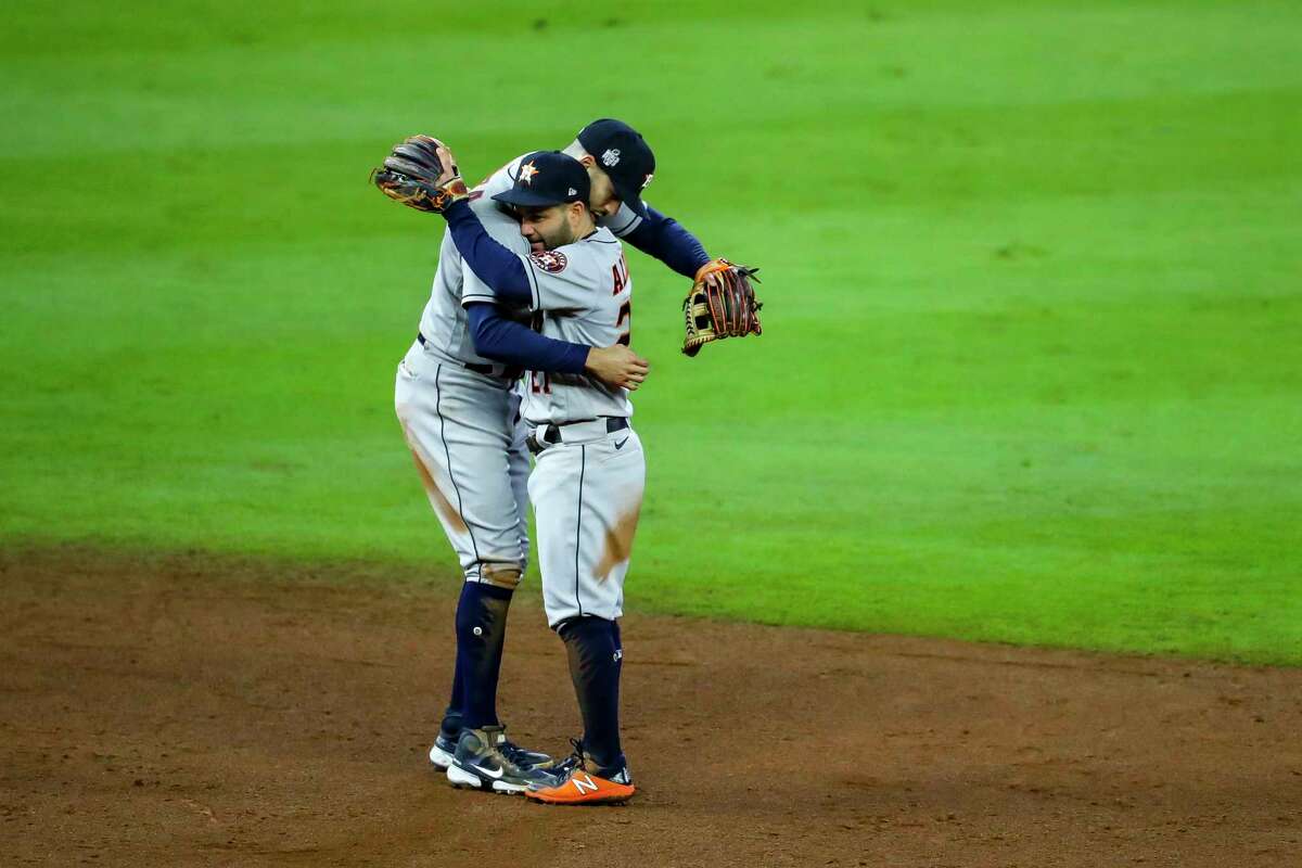After Tuesday night's loss in the World Series, Jose Altuve (right) said he hoped the Astros would be able to hold on to Carlos Correa, who is a free agent.