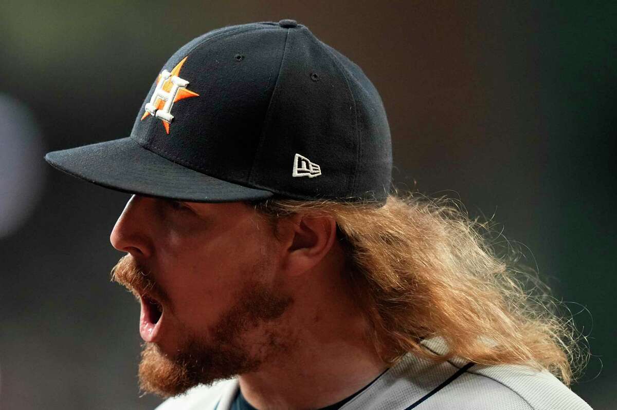 Houston Astros relief pitcher Ryne Stanek celebrates the last out in the seventh inning of Game 5 of baseball's World Series between the Houston Astros and the Atlanta Braves Sunday, Oct. 31, 2021, in Atlanta. (AP Photo/David J. Phillip)