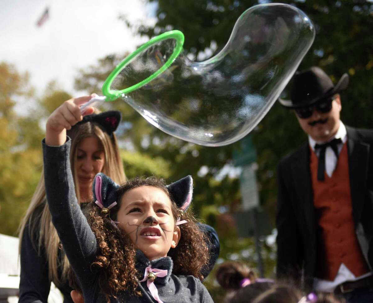 In photos Greet & Treat steps off on Greenwich Avenue with safe trick