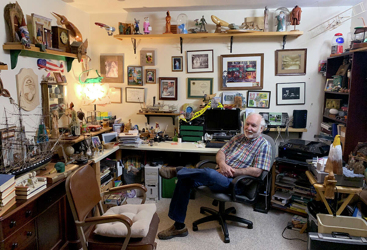 David Silvernail surrounded by his collection of artifacts. He and his wife Jane will present "Eclectic Interpretations" which opens Nov. 6 at The Art Studio, Inc. Photo by Andy Coughlan