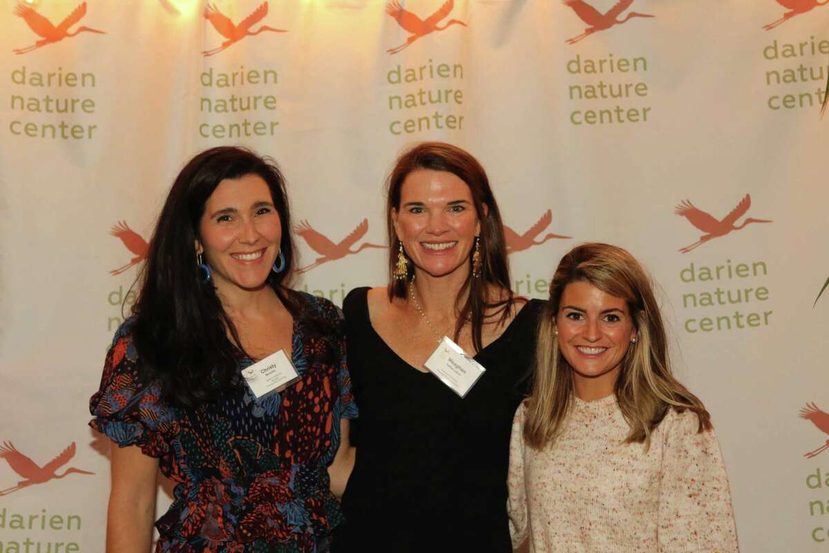 Fireside event co-chairs Christy Menzies and Meaghan Hetherington, and silent auction director Molly Young.