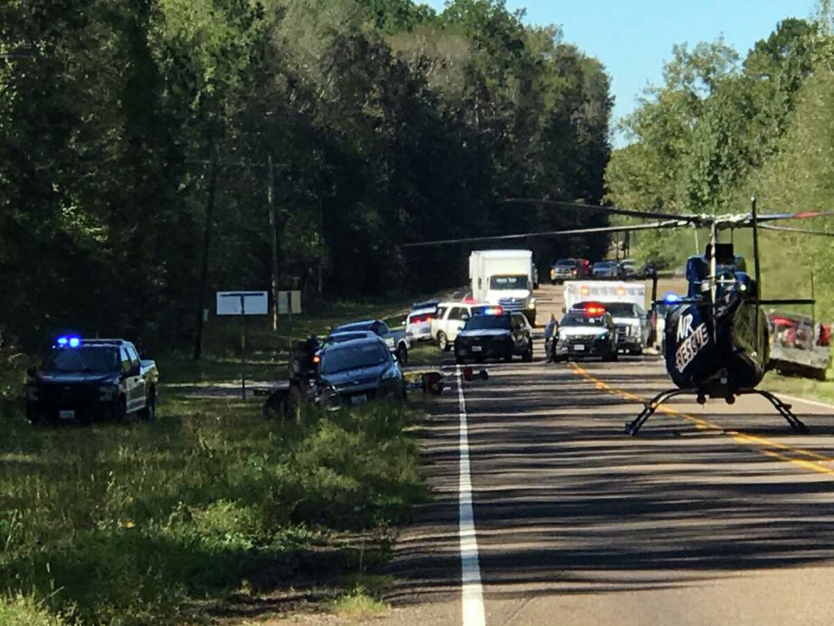 A medical helicopter transports a bicyclist to a hospital after the driver of a Ford Escape crashed into a group of cyclists traveling on FM 787 near Rye, Texas, on Saturday, Oct. 30, 2021. 
