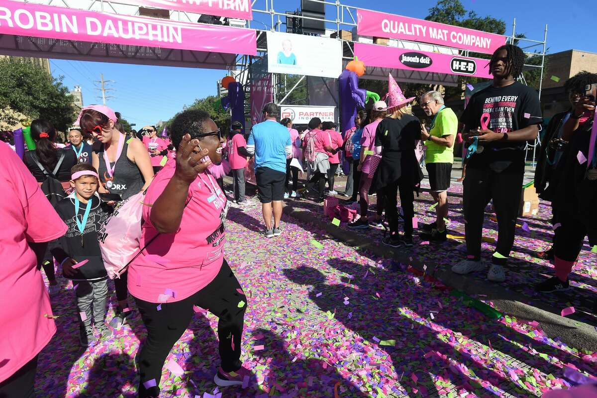 There was much celebration during the Julie Richardson Procter 5K Ribbon Run Monster Dash Saturday in Beaumont. Photo made Saturday, October 30, 2021 Kim Brent/The Enterprise