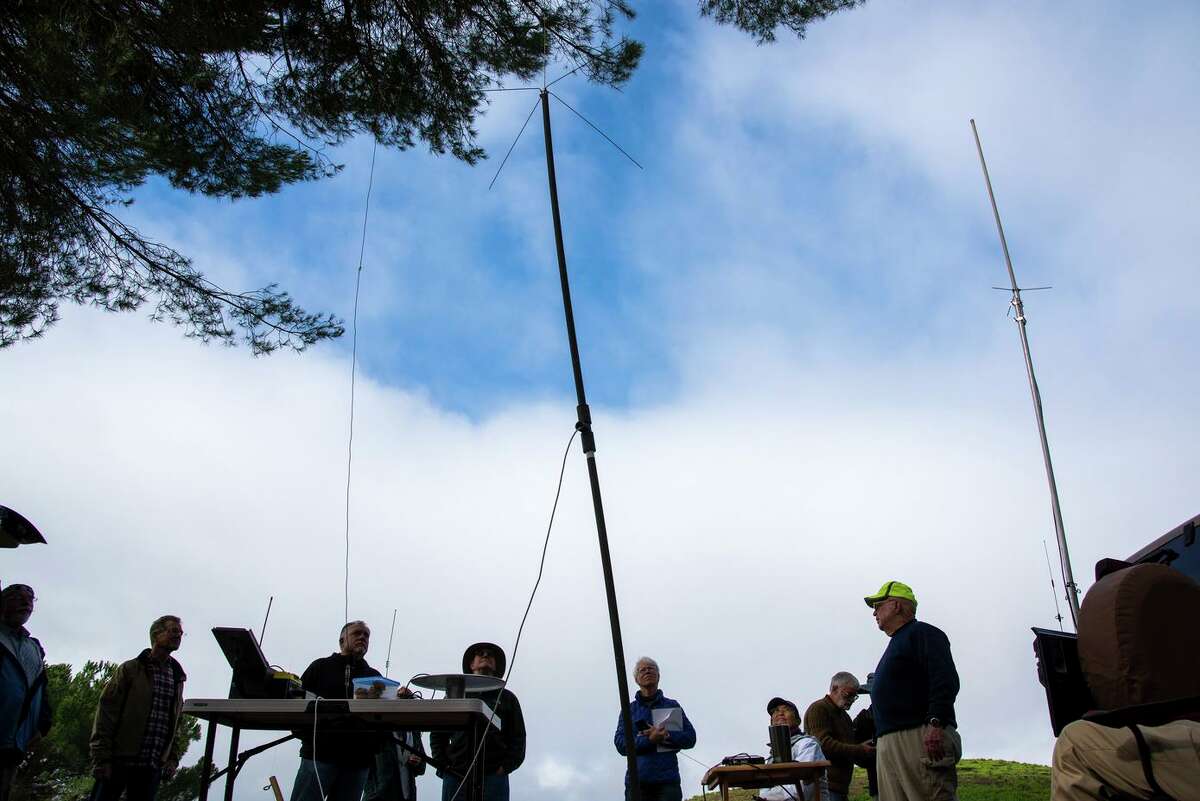 Members of Radio Communications Volunteers gather with ham radio antennas in San Rafael for a disaster training practice in preparation for emergency situations when internet and phone communications fail in Marin County.